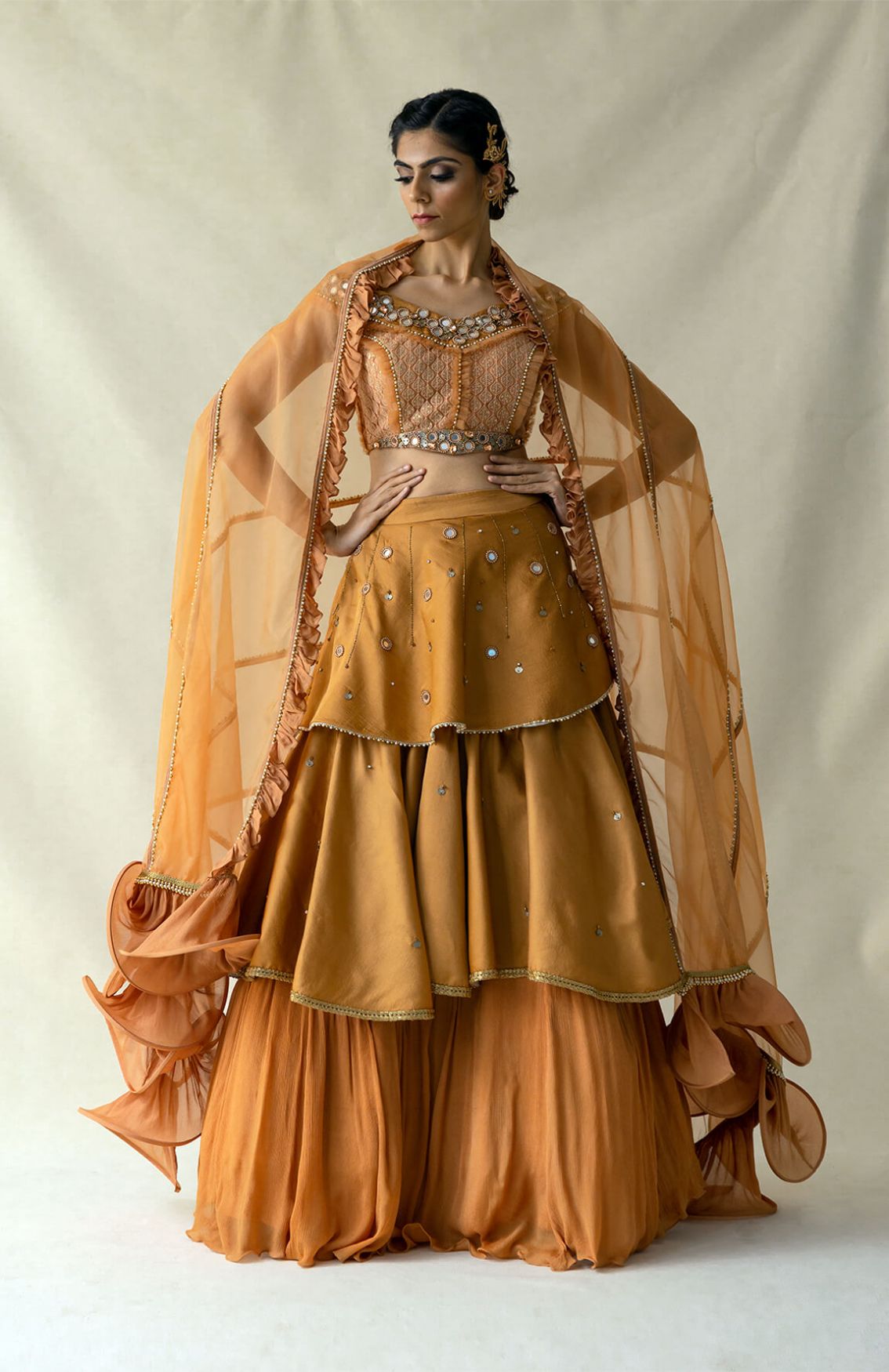 Rust Layered Lehenga With Off-Shoulder Blouse
