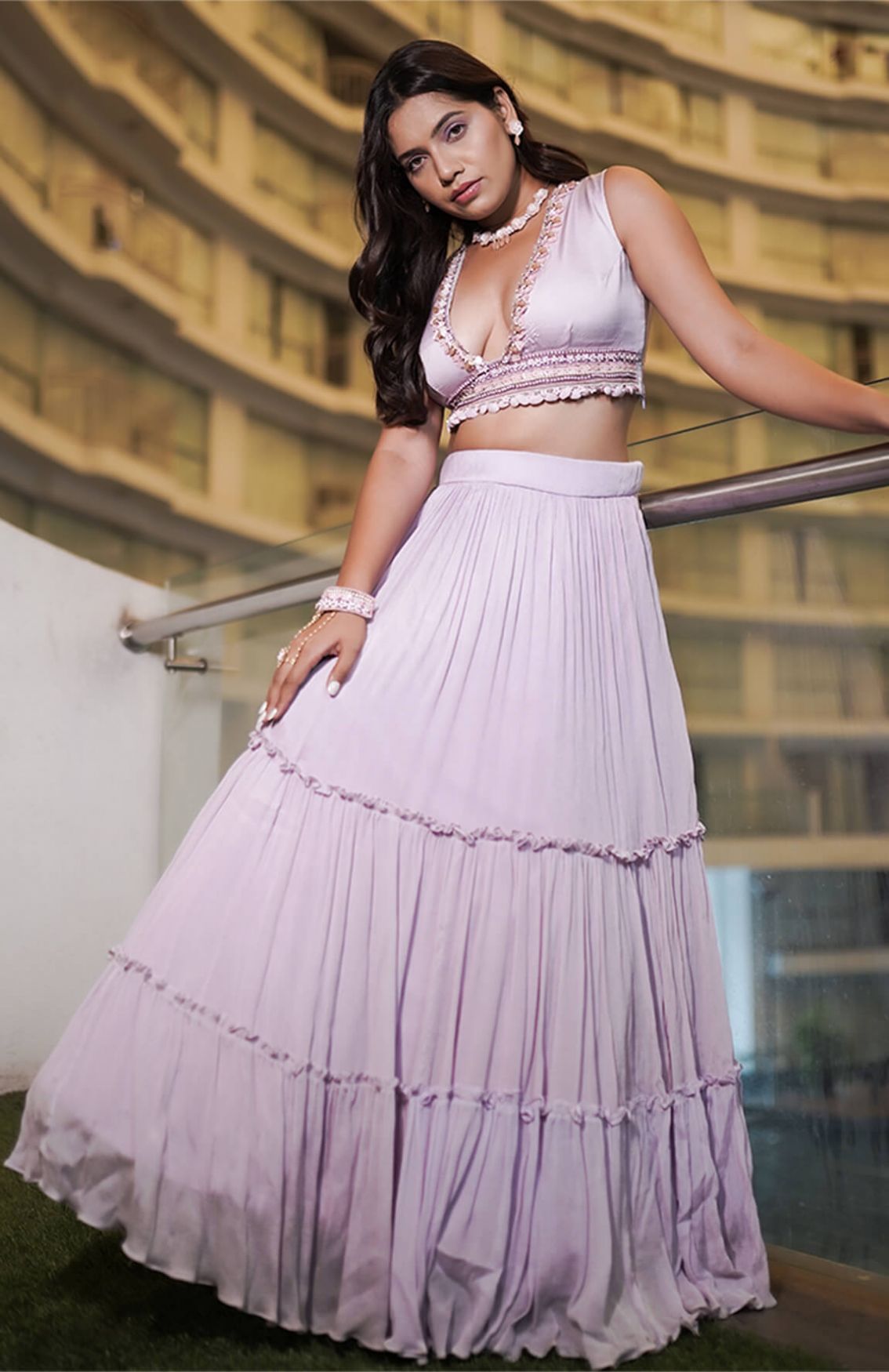 Lavender Ruffle Lehenga With Embroidered Blouse.