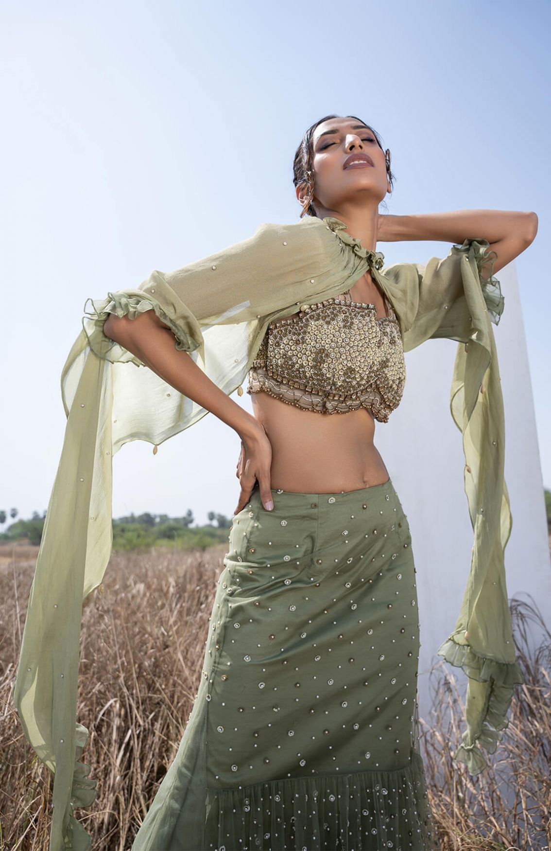 Moss Green Tiered Lehenga With Embellished Blouse
