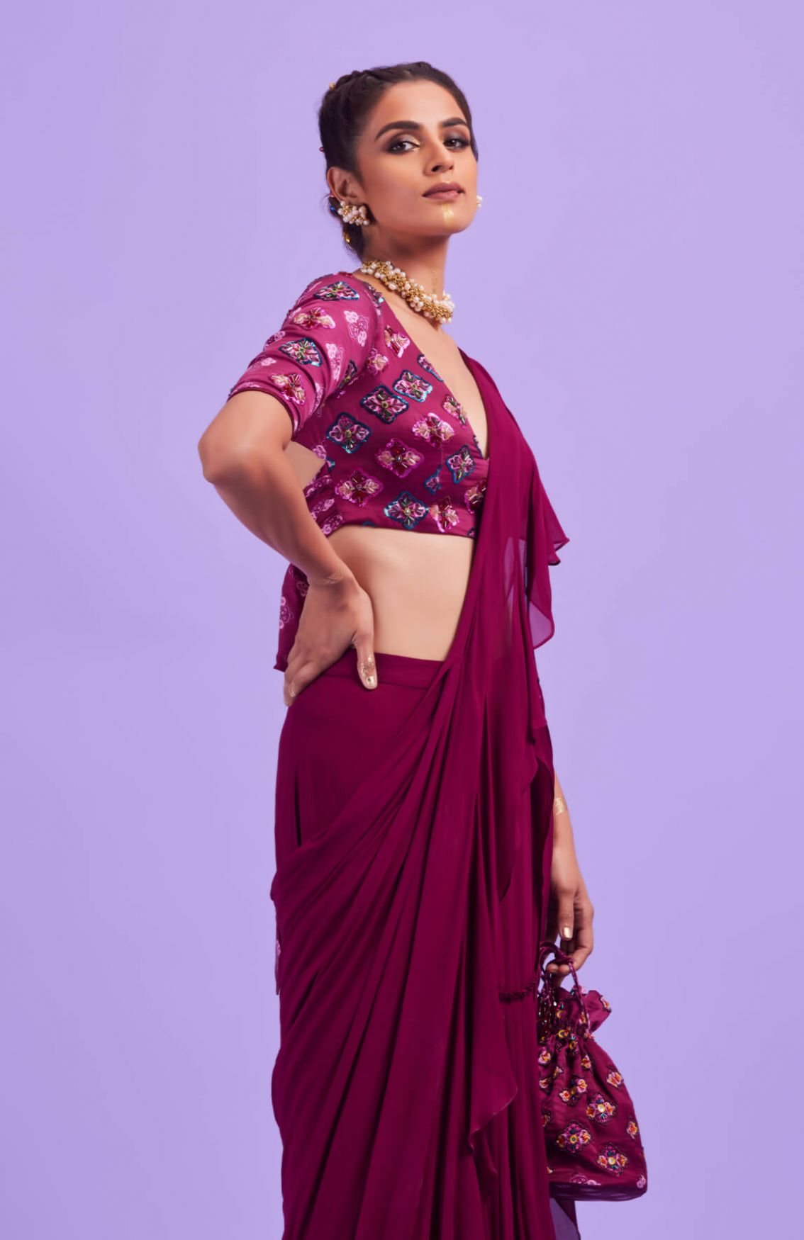 Purple Butta Highlighted Blouse With Purple Layer Ruffle Saree & Potli Bag