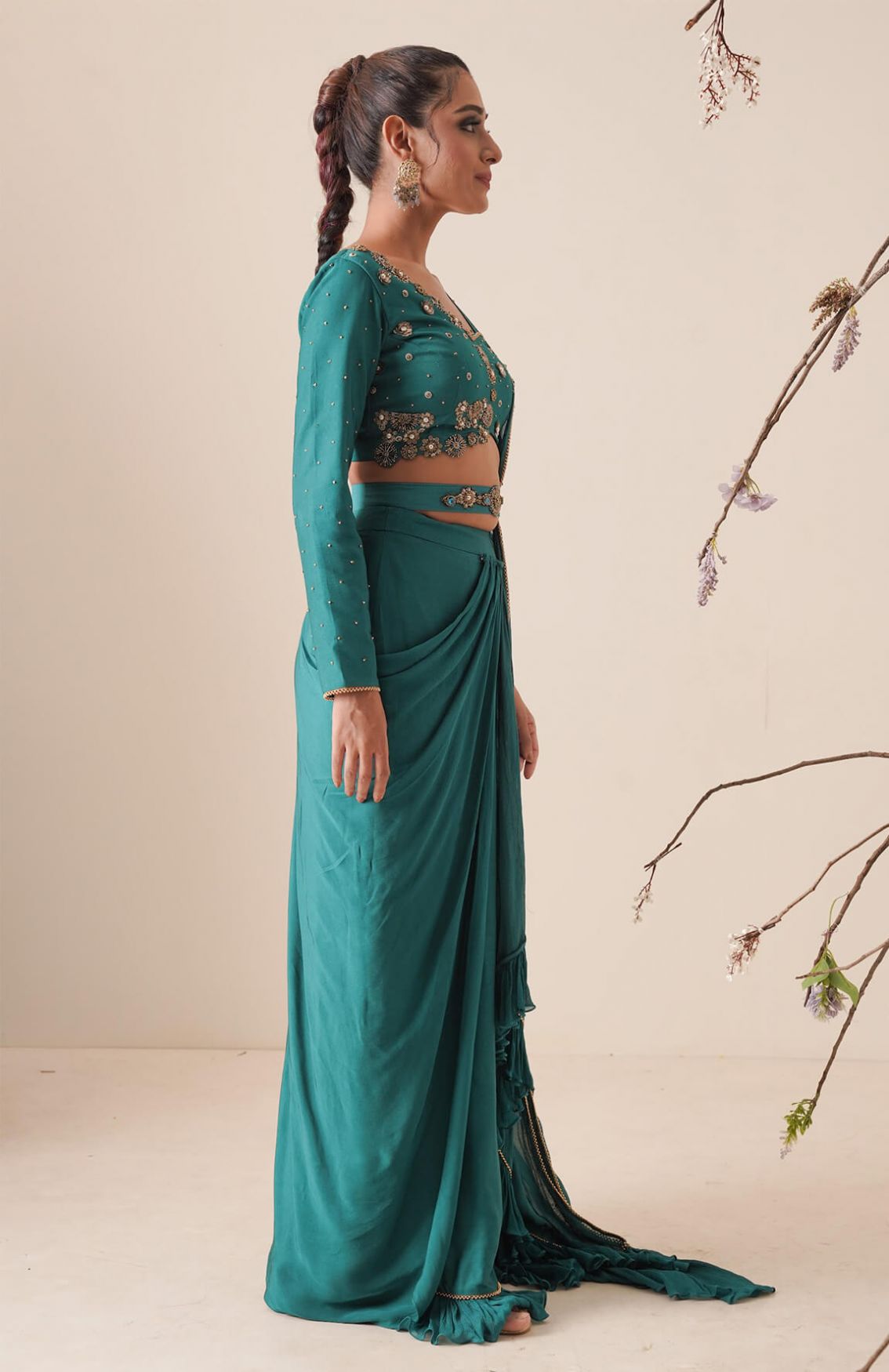 Teal Colour Pre-drape Saree With Waist Belt And Pallu Comes In A Full Sleeve Style.