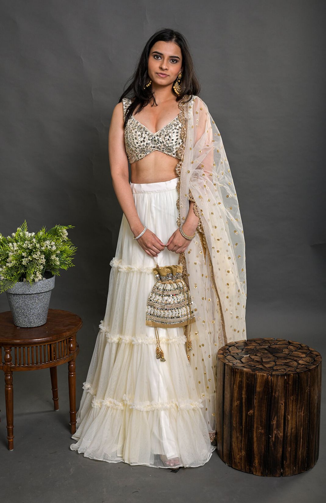 Ivory Tier And Ruffle Lehenga Set With Mirror Work Blouse
