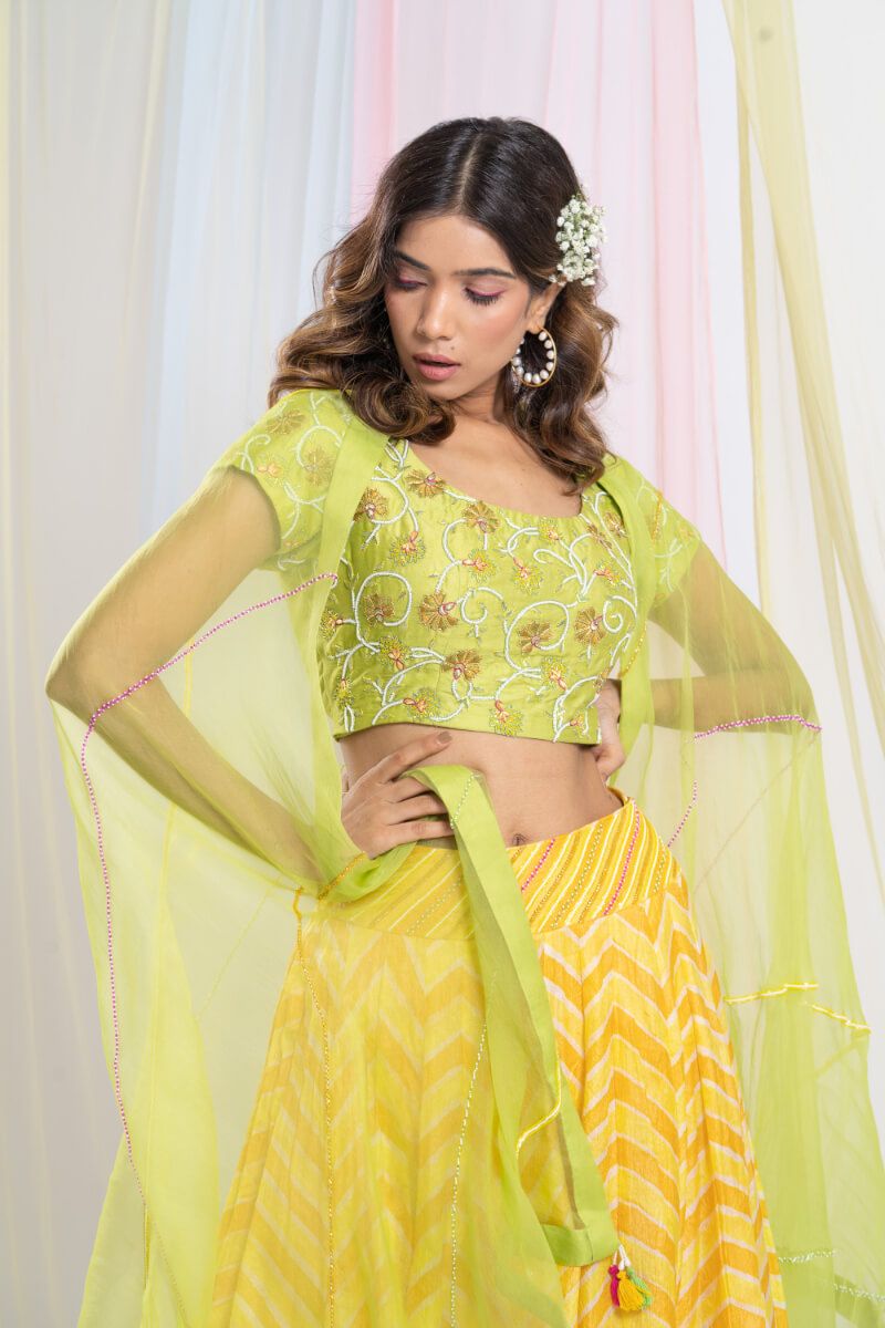 Yellow Leheria Skirt With Lime Green Embroidered Blouse And Organza Dupatta