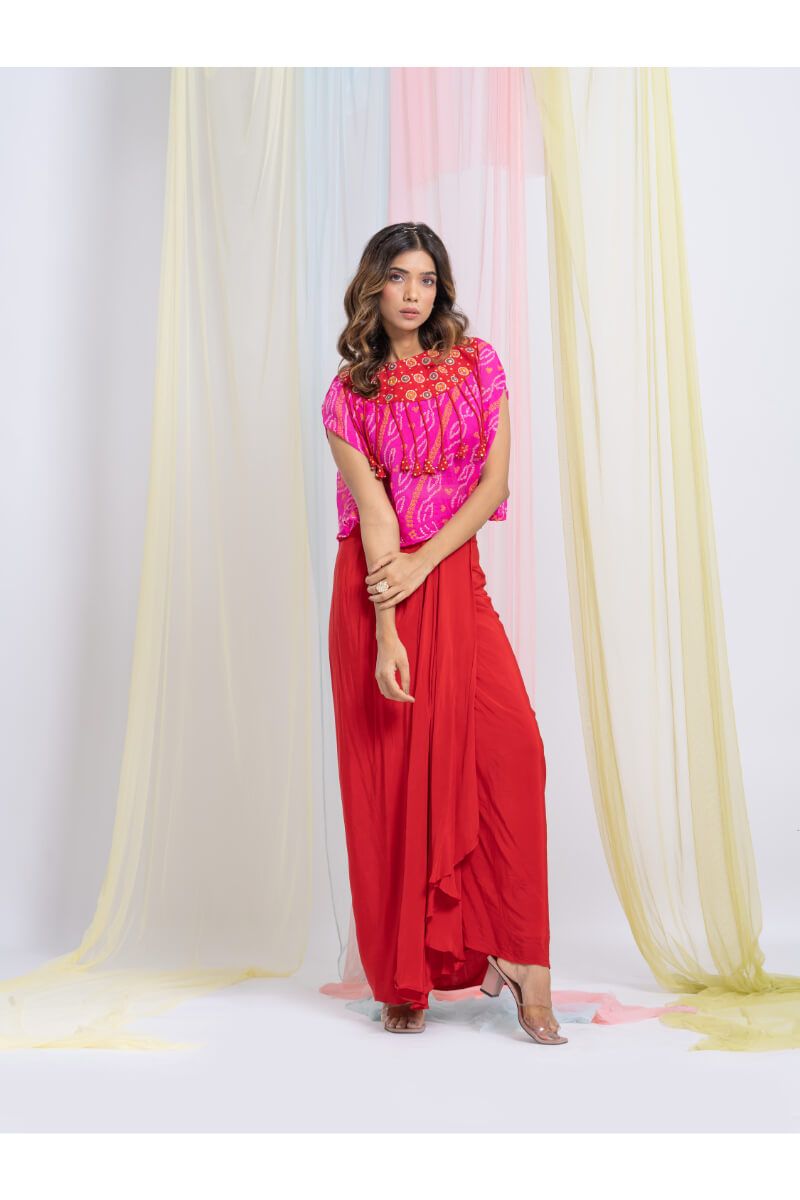 Pink Chunari Short Cape With Tassel Hangings And Red Drape Skirt