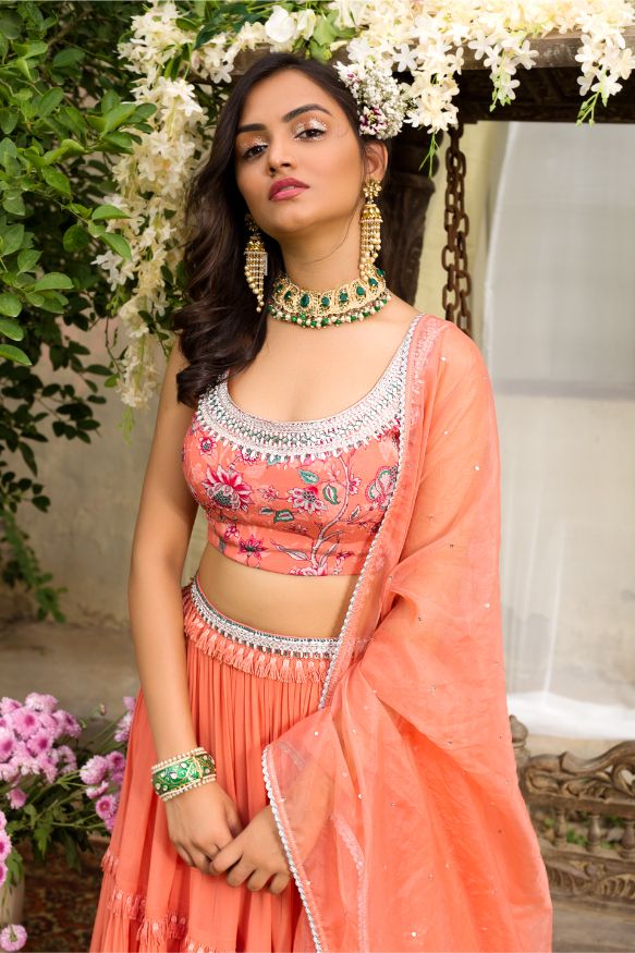 Coral Printed Blouse With Coral Tiered Lehenga And Dupatta