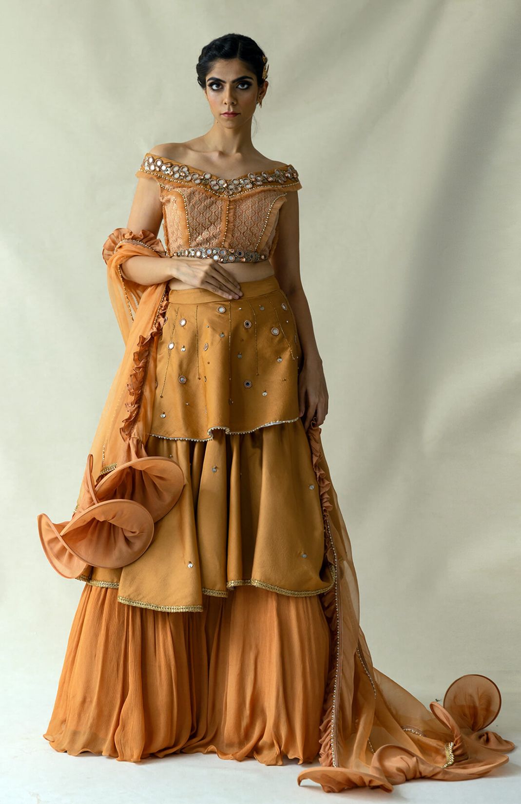 Rust Layered Lehenga With Off-Shoulder Blouse